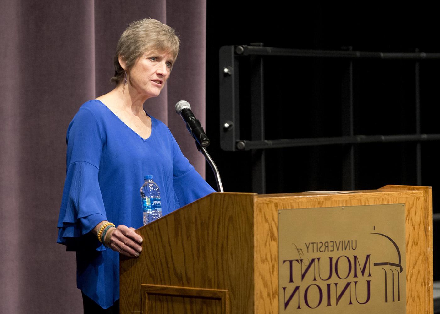 Dr. Sheryl Holt speaking at Mount Union's PT White Coat ceremony